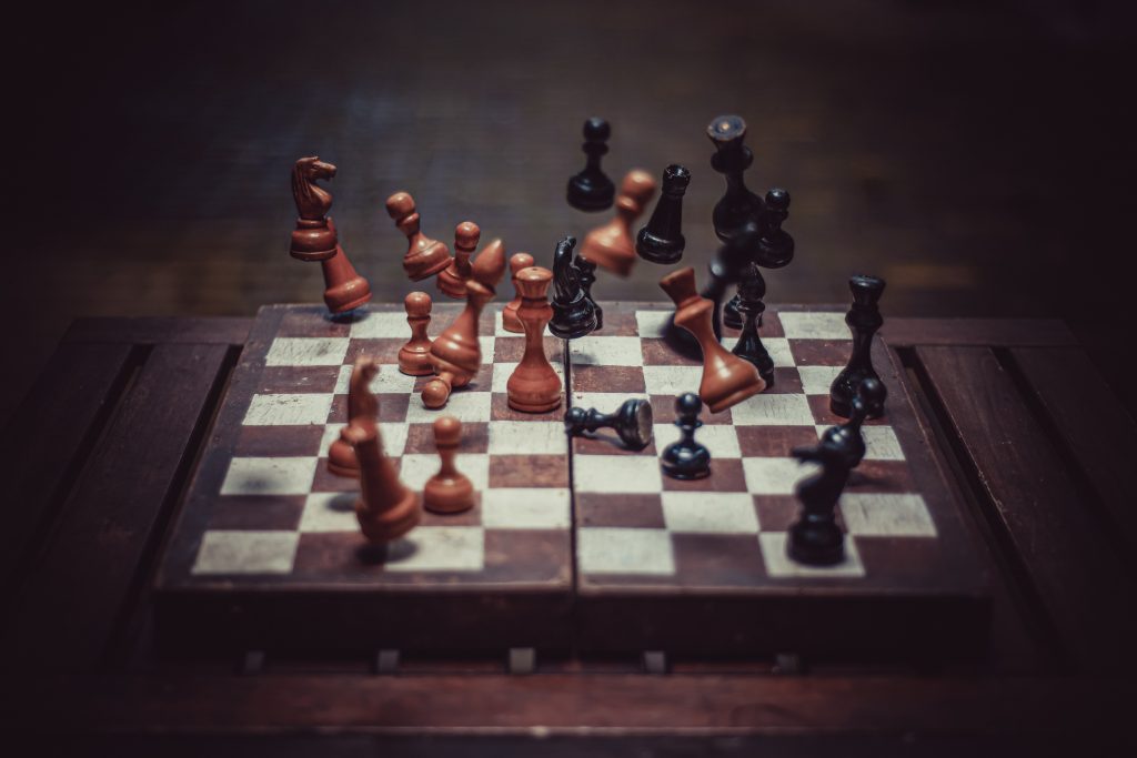 falling chess pieces on the chessboard